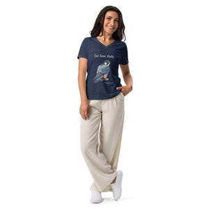 Heather navy women's v-neck bird t-shirt with the words, Fast. Fierce. Fluffy. and a peregrine falcon graphic below. Worn by a woman on a white background.