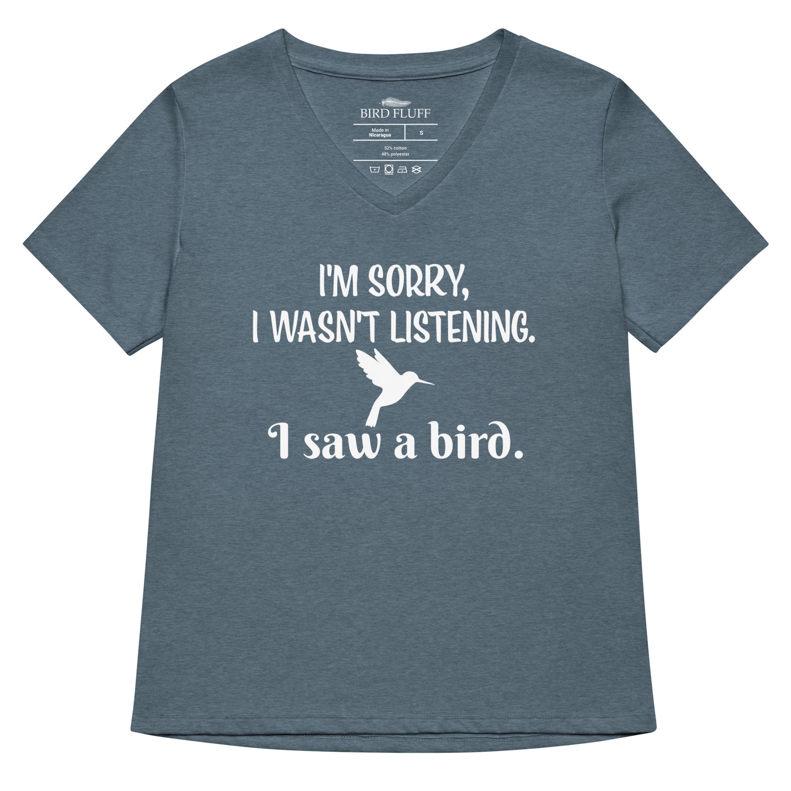 Heather slate blue women's relaxed v-neck bird t-shirt with the words I'm sorry I wasn't listening, I saw a bird. And a graphic of a hummingbird flying.